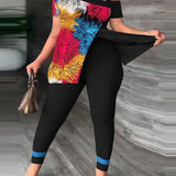 Completo da donna – Top rilassato con spalle scoperte – Pantaloni aderenti con fantasia – Tessuto leggero