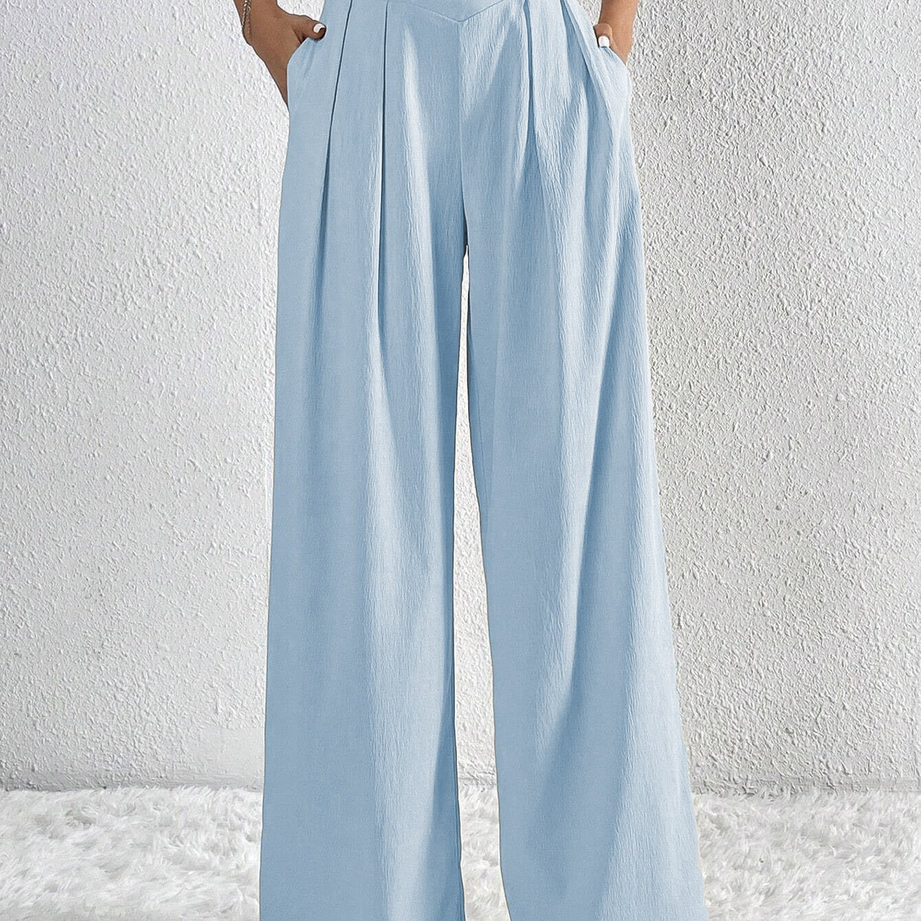 Pantaloni larghi da donna – Vita alta – Tessuto leggero – Taglio fluido con pieghe e tasche