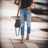 Jeans da donna – Taglio dritto e rilassato – Effetto consumato – Orlo sfrangiato