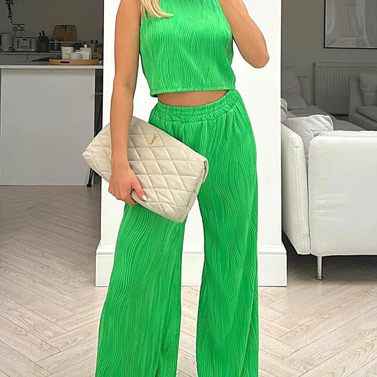 Completo due pezzi da donna: top corto aderente senza maniche, pantaloni dritti a vita alta