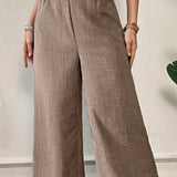 Pantaloni larghi da donna – Vita alta – Tessuto fluido – Lunghezza intera – Vita elasticizzata