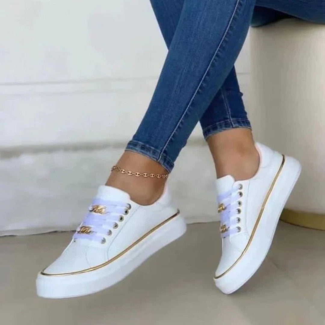 Sneakers da donna Cina - Eleganza con accenti dorati