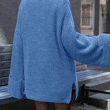 Blusa vintage in maglia con scollo a V e spacchi