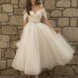 Elegante abito da festa midi con scollo a V e maniche raglan