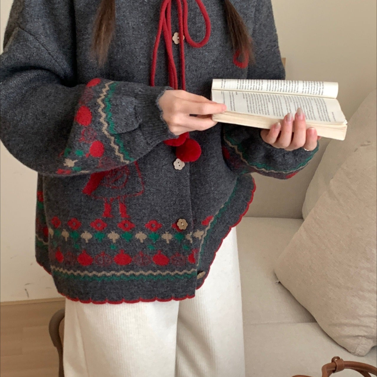 Cardigan oversize con pompon