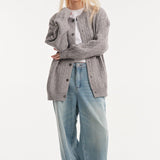 Cardigan a trecce dalla vestibilità rilassata