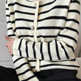 Cardigan corto in maglia a righe