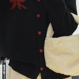 Cardigan rotondo in jacquard con fiocco morbido