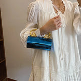 Borsa da sera a tracolla cilindrica in acrilico