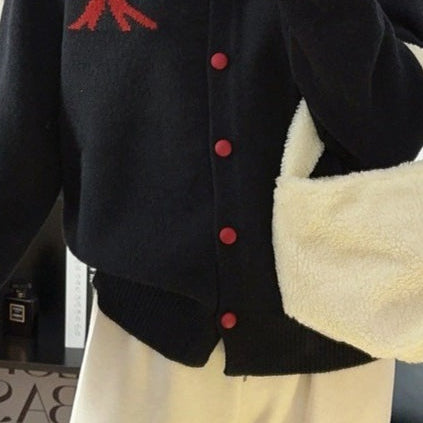 Cardigan rotondo in jacquard con fiocco morbido