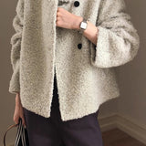 Cappotto alla moda in lana con bottoni automatici