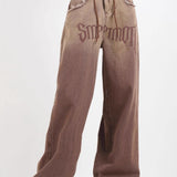 Jeans vintage a gamba larga sfilacciati a vita alta sfumati