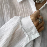 Camicetta a maniche lunghe casual chic tinta unita