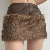 Minigonna a vita bassa con pannelli in pelle sfocata