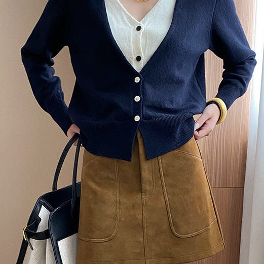 Cardigan bicolore con scollo a V