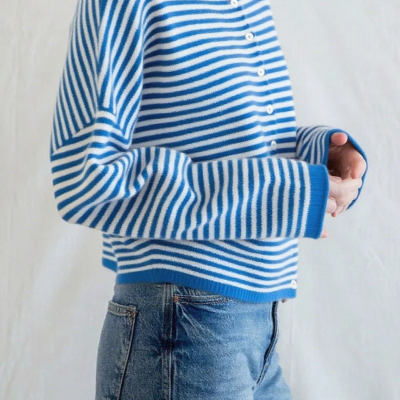 Cardigan girocollo in maglia a righe