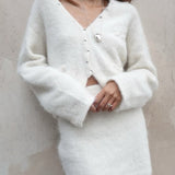 Elegante completo due pezzi con gonna in maglia a coste