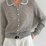 Cardigan in maglia di lana leggera con colletto alla Peter Pan in pizzo