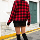 Cardigan aderente con bottoni in tartan