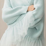 Cardigan in maglia trasparente con volant