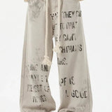 Jeans dritti in denim con graffiti color albicocca