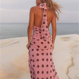 Abito lungo a pois con cintura in vita e schiena scoperta