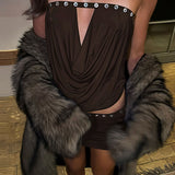 Completo minigonna attillata senza spalline con bottoni arricciati