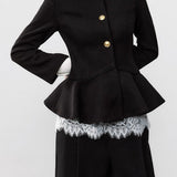 Cappotto elegante in lana nera con vita plissettata