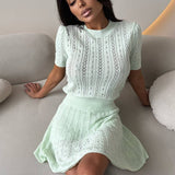 Completo gonna con scollo rotondo e taglio in maglia leggera e solida