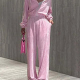 Completo da ufficio in due pezzi con pantaloni dritti e cerniera in maglia rosa