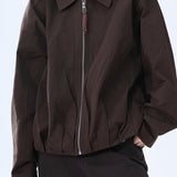 Giacca rilassata in similpelle marrone