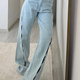 Jeans dritti vintage con tagli rovinati