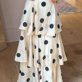 Completo top senza maniche con gonna a balze e scollo all'americana a pois