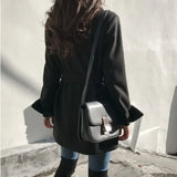 Soprabito nero in misto lana con lacci