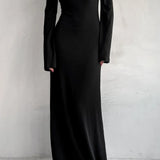 Abito lungo aderente in maglia nera elegante
