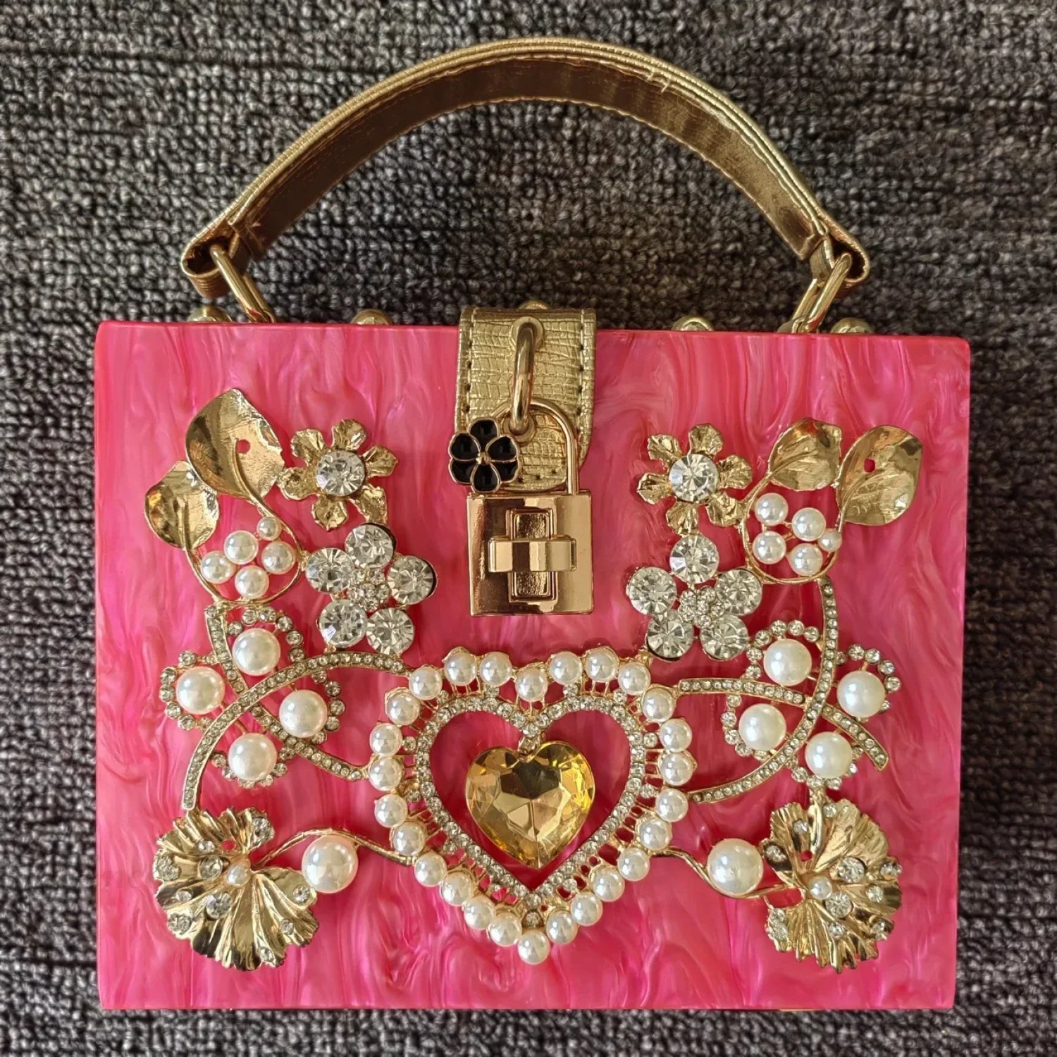 Borsa da sera con cuore e paillettes scintillanti