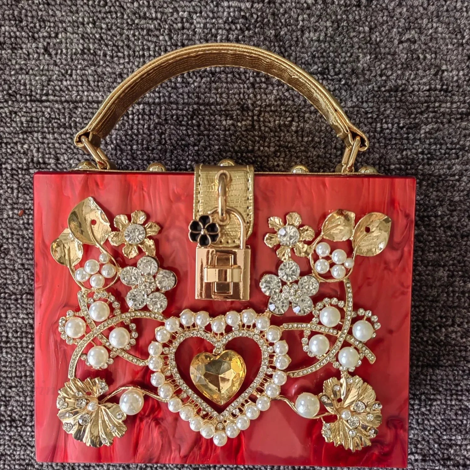 Borsa da sera con cuore e paillettes scintillanti