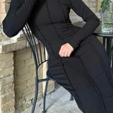 Abito aderente con scollo rotondo e spacco