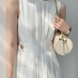 Abito midi alla moda con maniche lunghe e bottoni