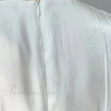 Abito midi alla moda con maniche lunghe e bottoni