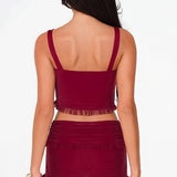 Completo gonna con pantaloncini aderenti e volant e top con bottoni automatici alla moda