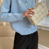 Cardigan raglan con bottoni in giada