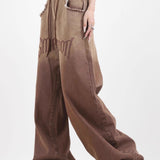 Jeans vintage a gamba larga sfilacciati a vita alta sfumati