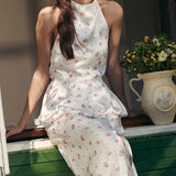 Completo due pezzi con gonna lunga e gilet con orlo a palloncino stampato in raso