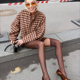 Completo due pezzi con giacca con zip e pantaloncini in pied de poule vintage