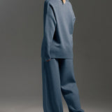 Completo due pezzi con maglione lavorato a maglia con colletto polo e pantaloni a gamba larga