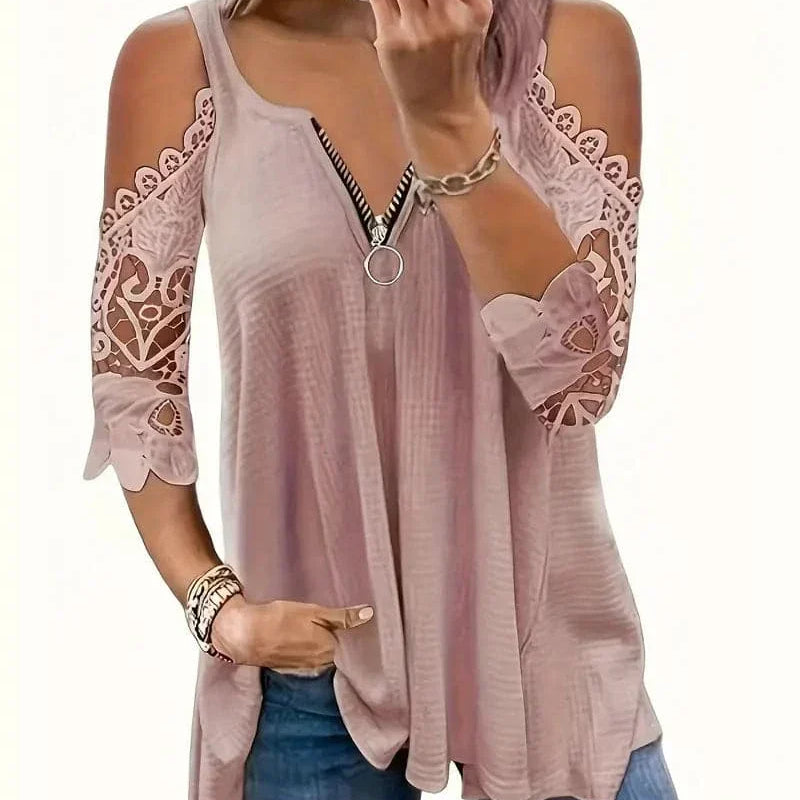 Lotte - Blusa con chiusura a zip e spalle insolite