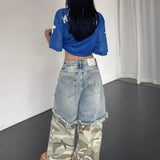 Jeans streetwear larghi con stampa patchwork mimetica