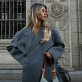 Blazer casual oversize di lusso con spalline e spacco a un bottone