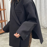 Blazer casual oversize di lusso con spalline e spacco a un bottone
